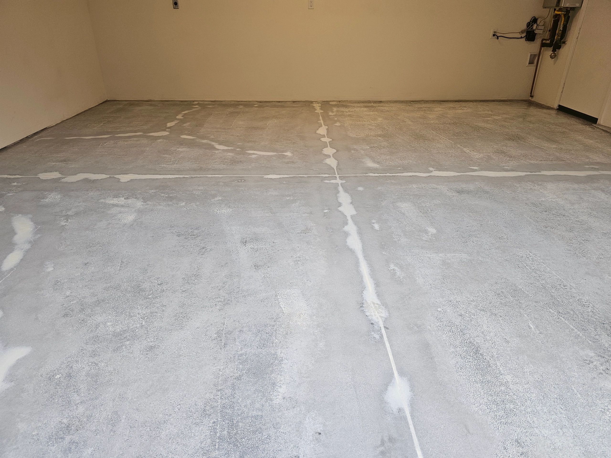 Close-up of finished epoxy floor coating — smooth polished surface